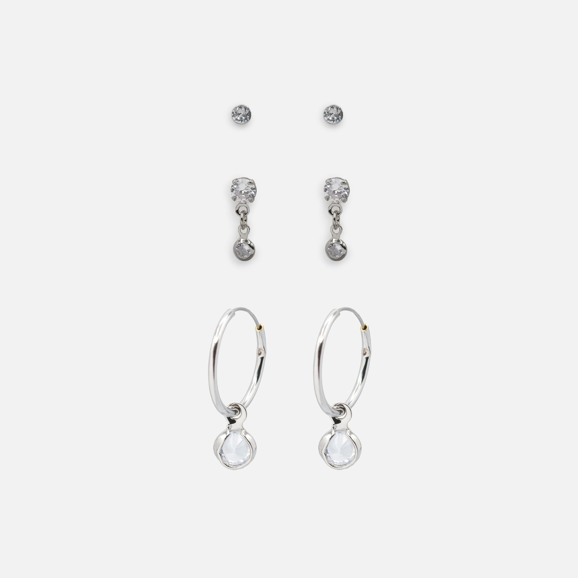 Trio de boucles d'oreilles argentées avec zircons cubiques