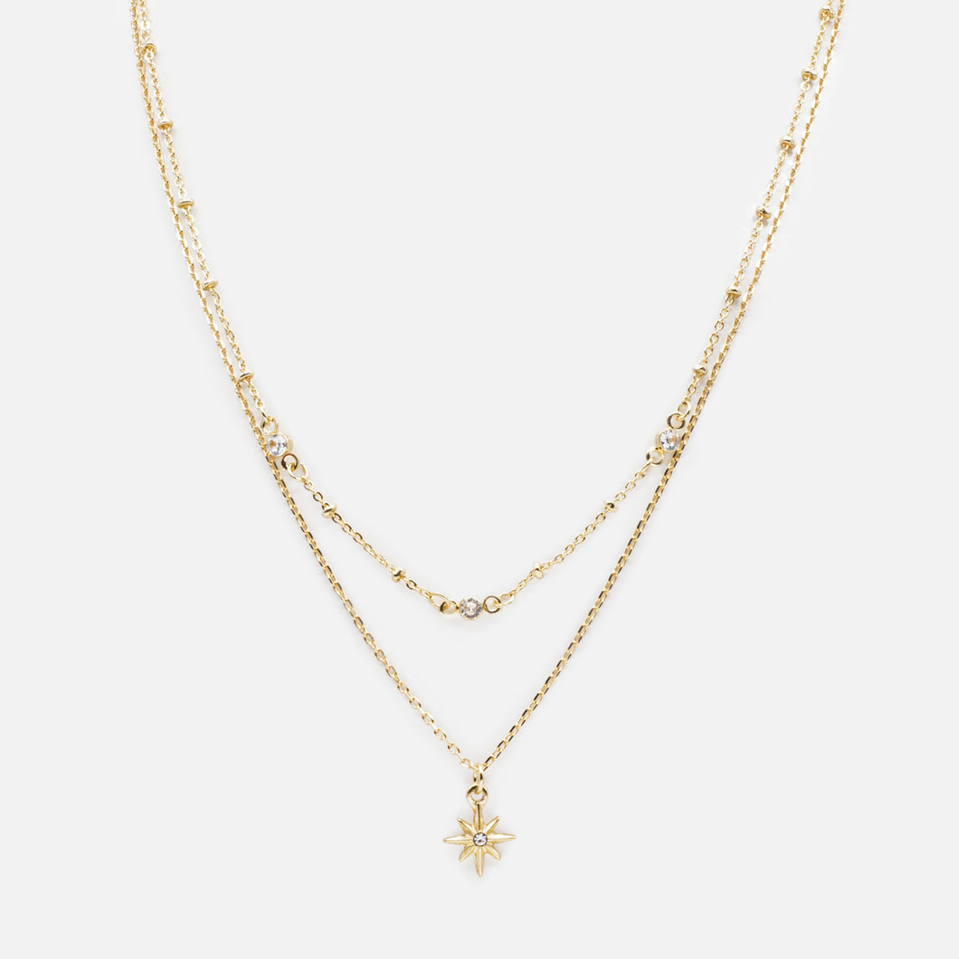 Set of two gold star and cubic zirconia necklaces