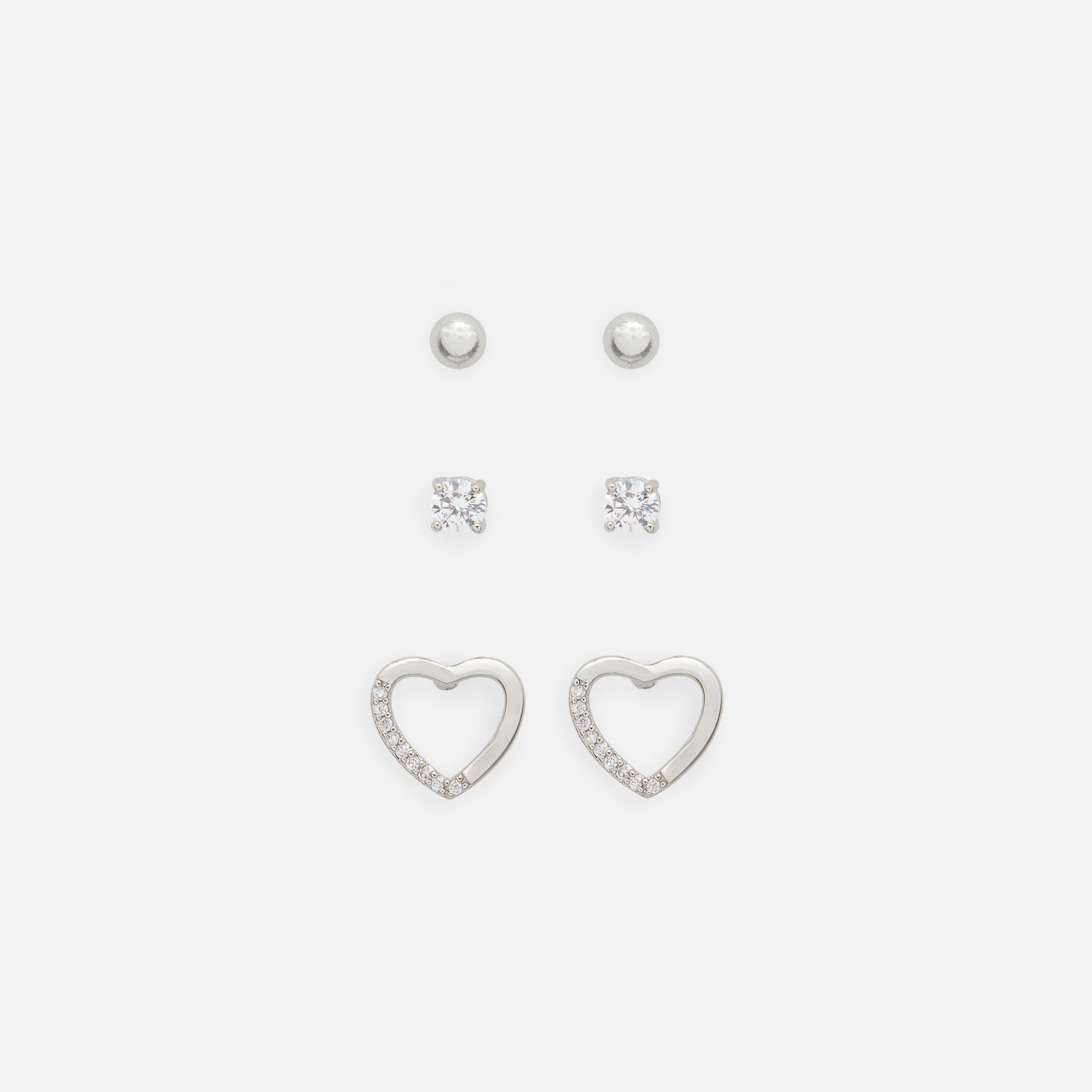 Trio de boucles d'oreilles argentées variées