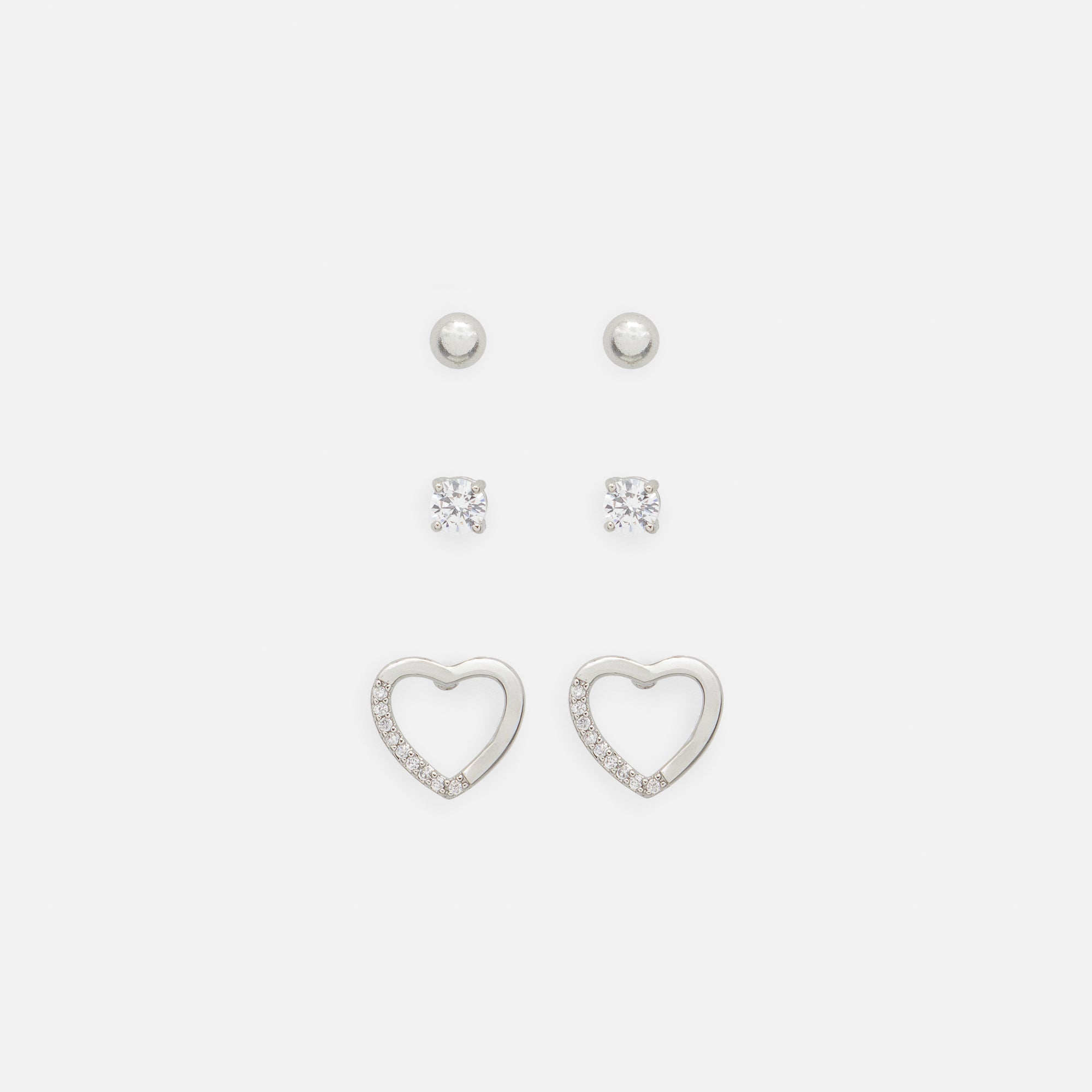 Trio de boucles d'oreilles argentées variées