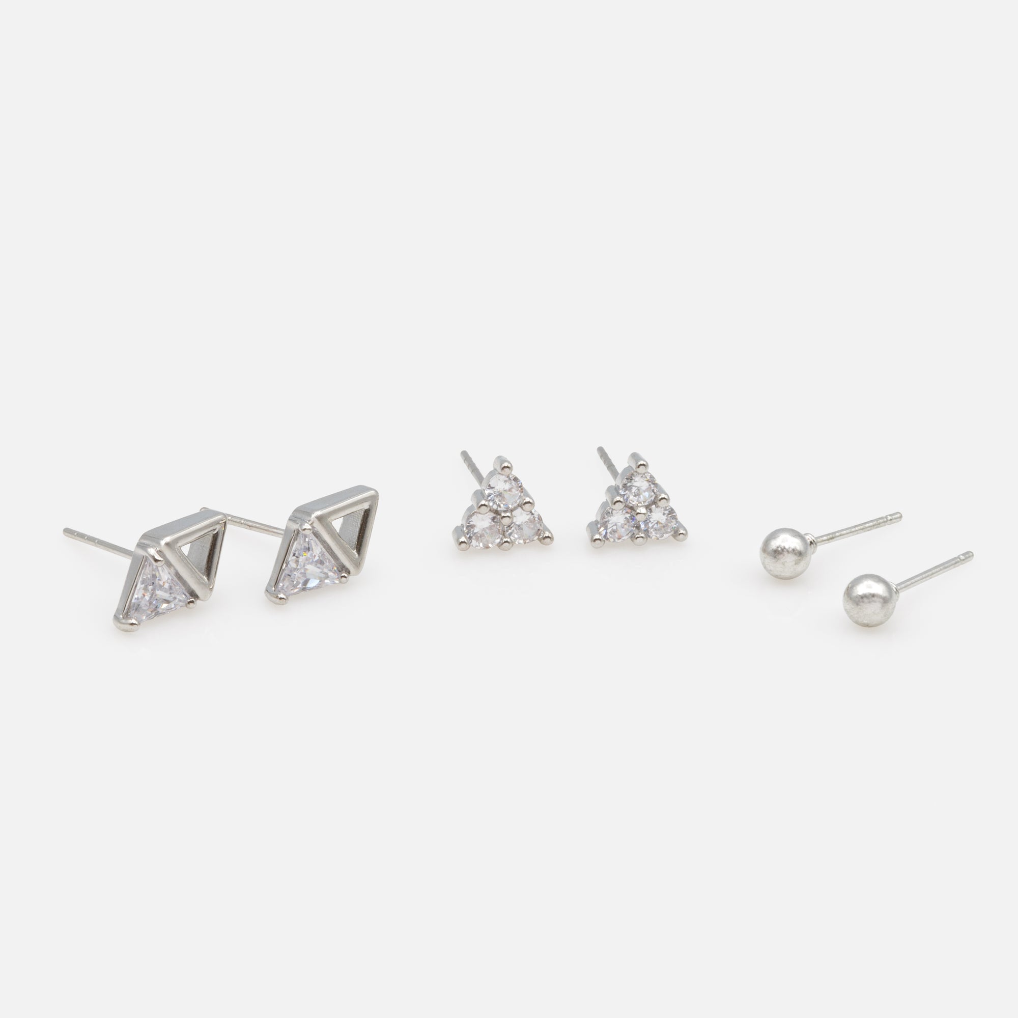 Trio of triangular and silver ball earrings with cubic zirconia