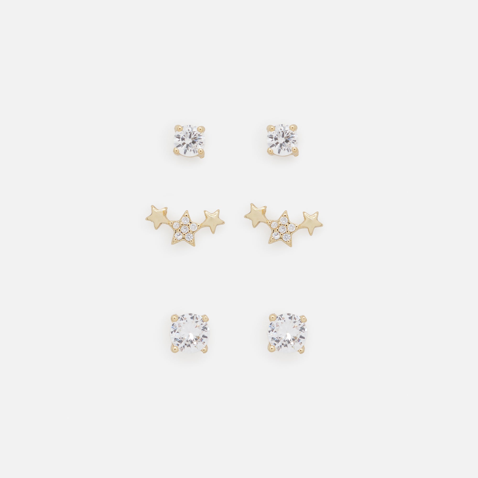 Trio of golden shower of stars and cubic zirconia earrings