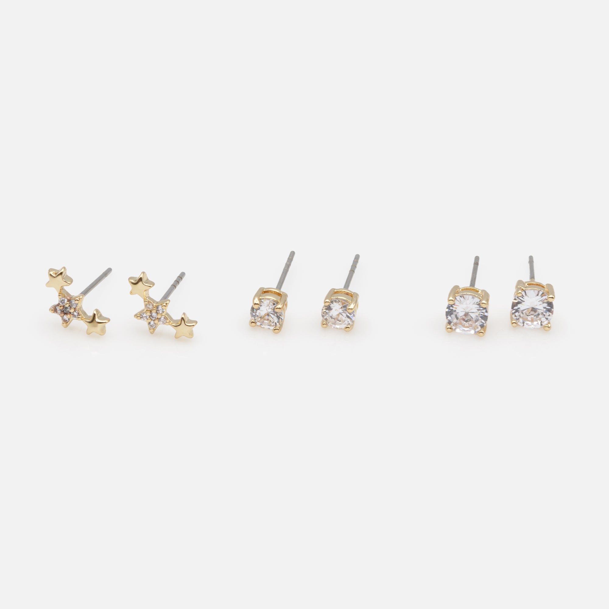 Trio of golden shower of stars and cubic zirconia earrings