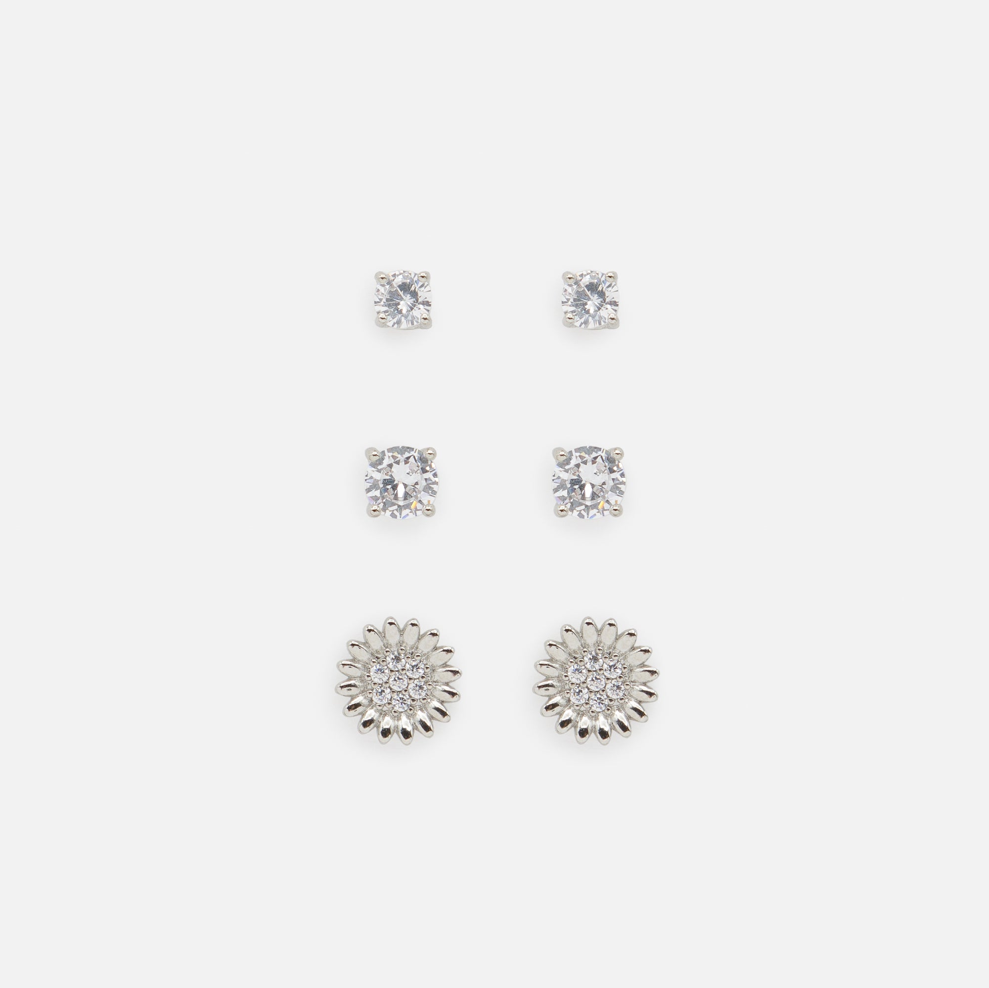 Trio of silver sunflower and cubic zirconia earrings