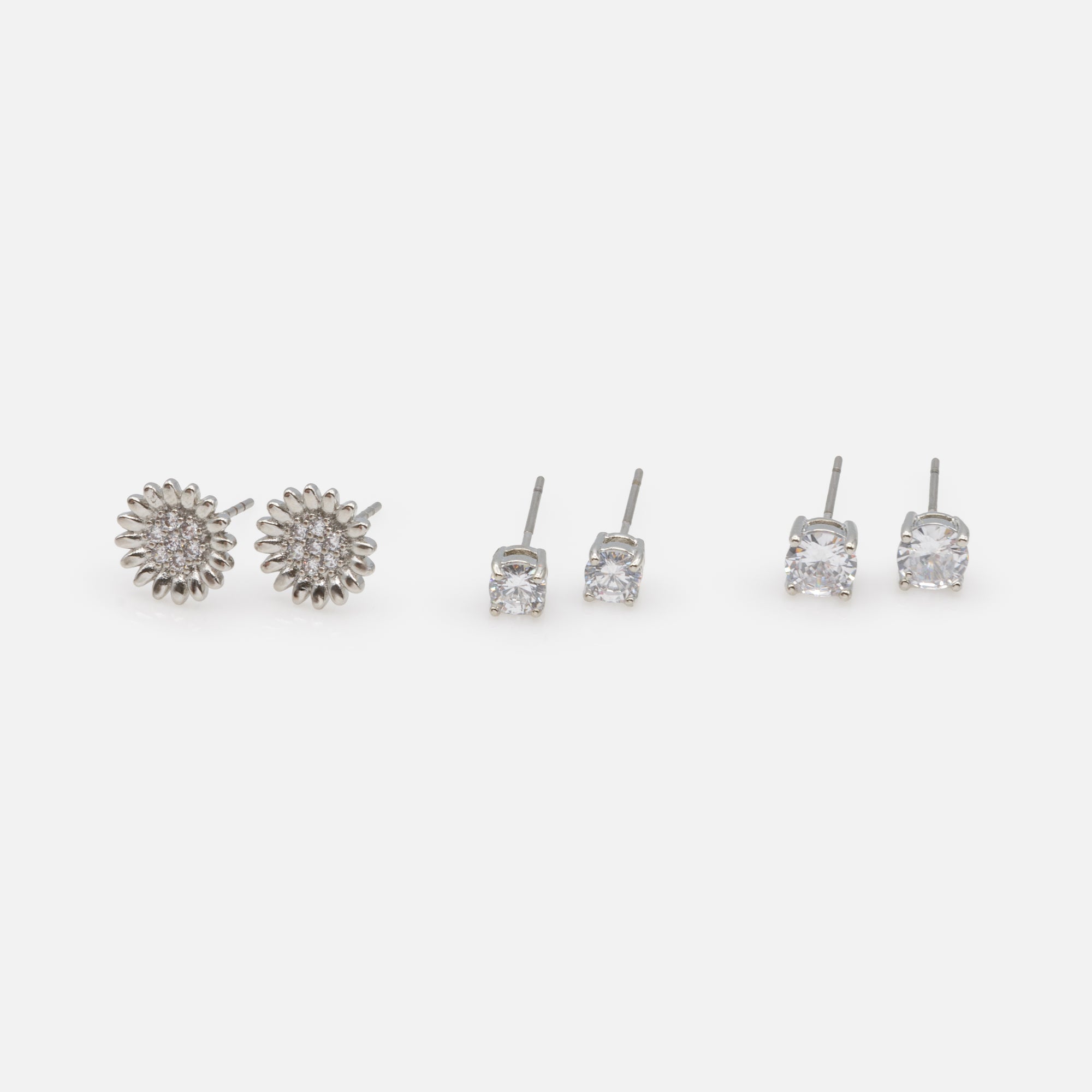 Trio of silver sunflower and cubic zirconia earrings