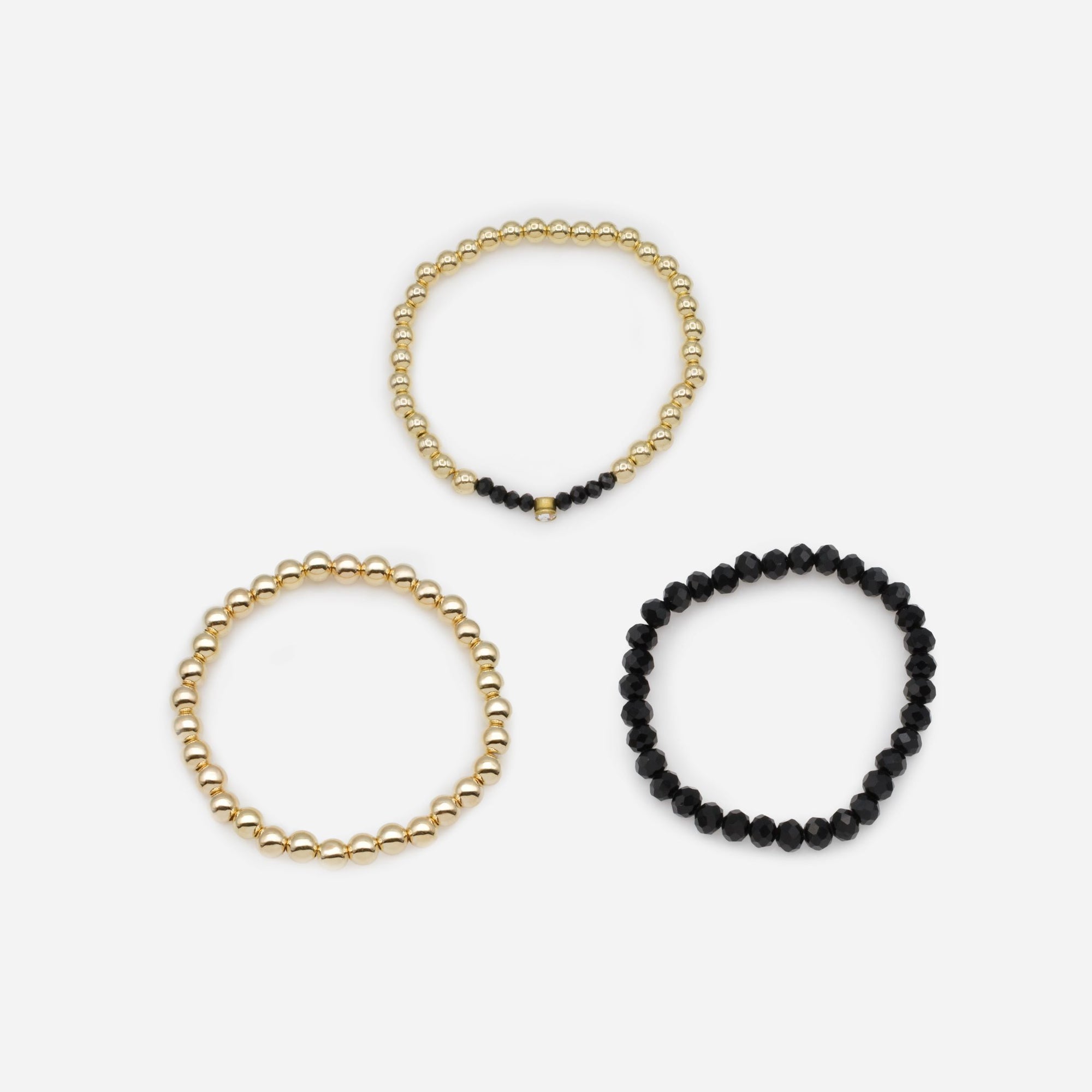 Trio de bracelets élastiques avec billes noires et dorées