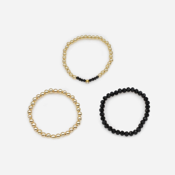 Charger l&#39;image dans la galerie, Trio de bracelets élastiques avec billes noires et dorées
