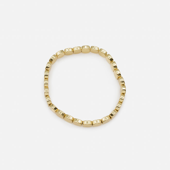 Gold elastic bracelet with flat beads
