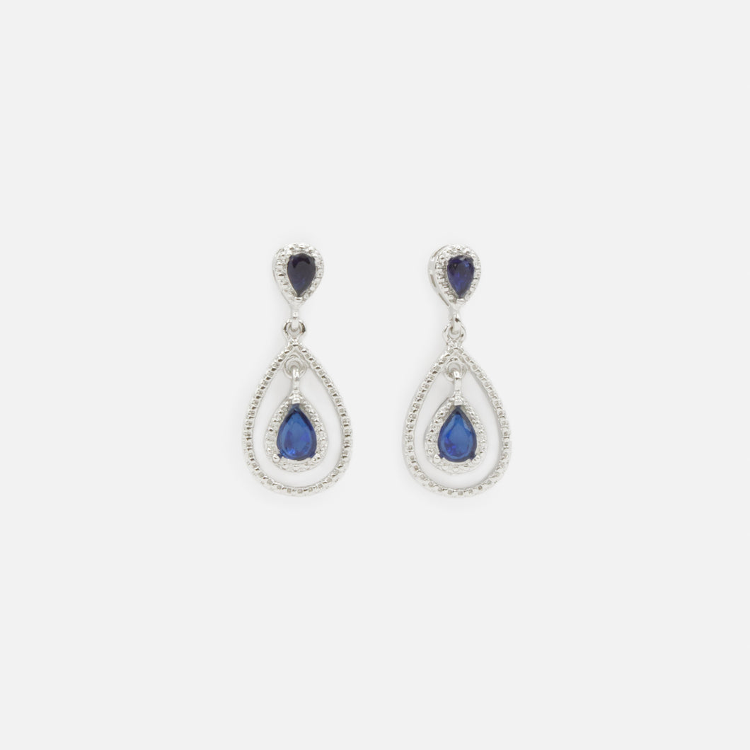 Boucles d'oreilles argentées avec pierres bleues