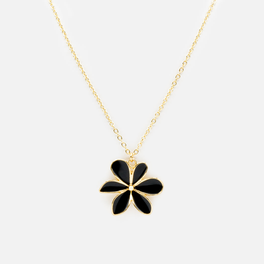 Collier doré avec breloque fleur noire