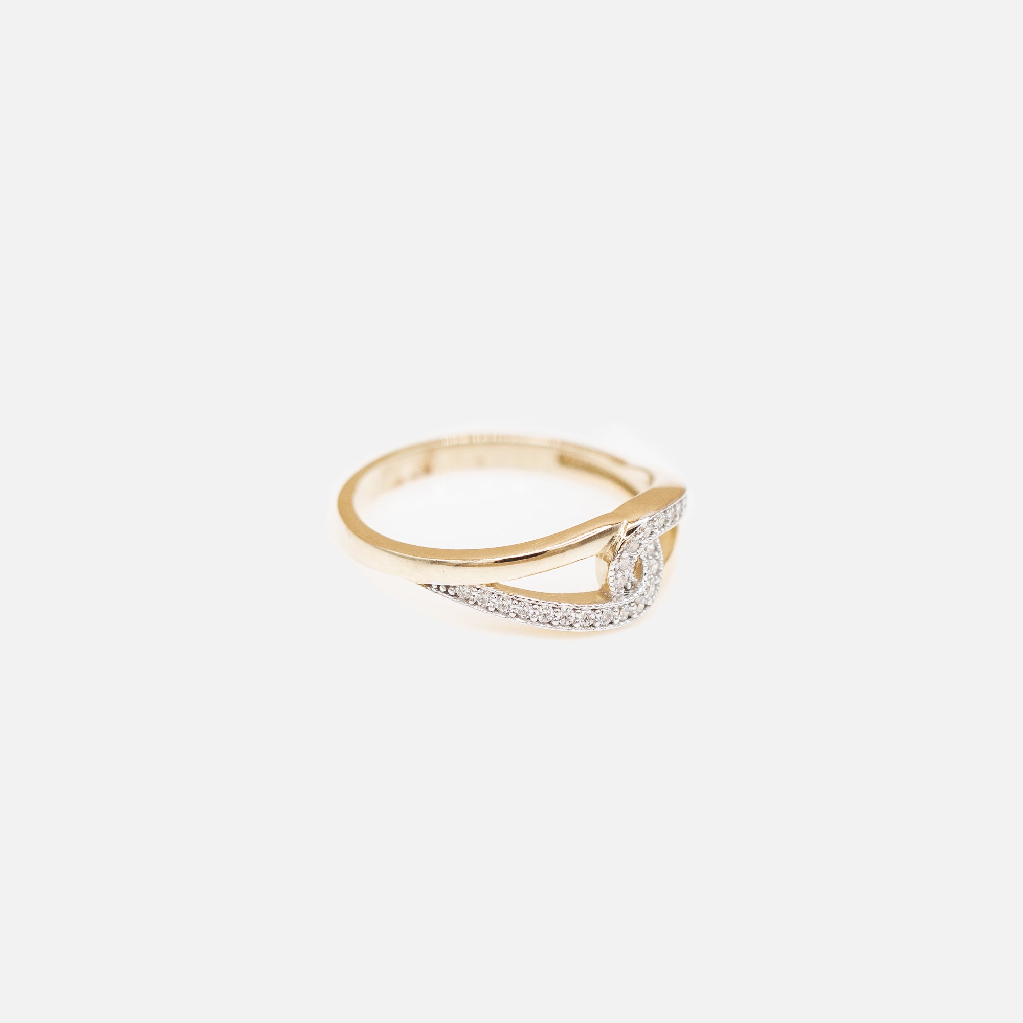 10k yellow gold crossed ring with stones