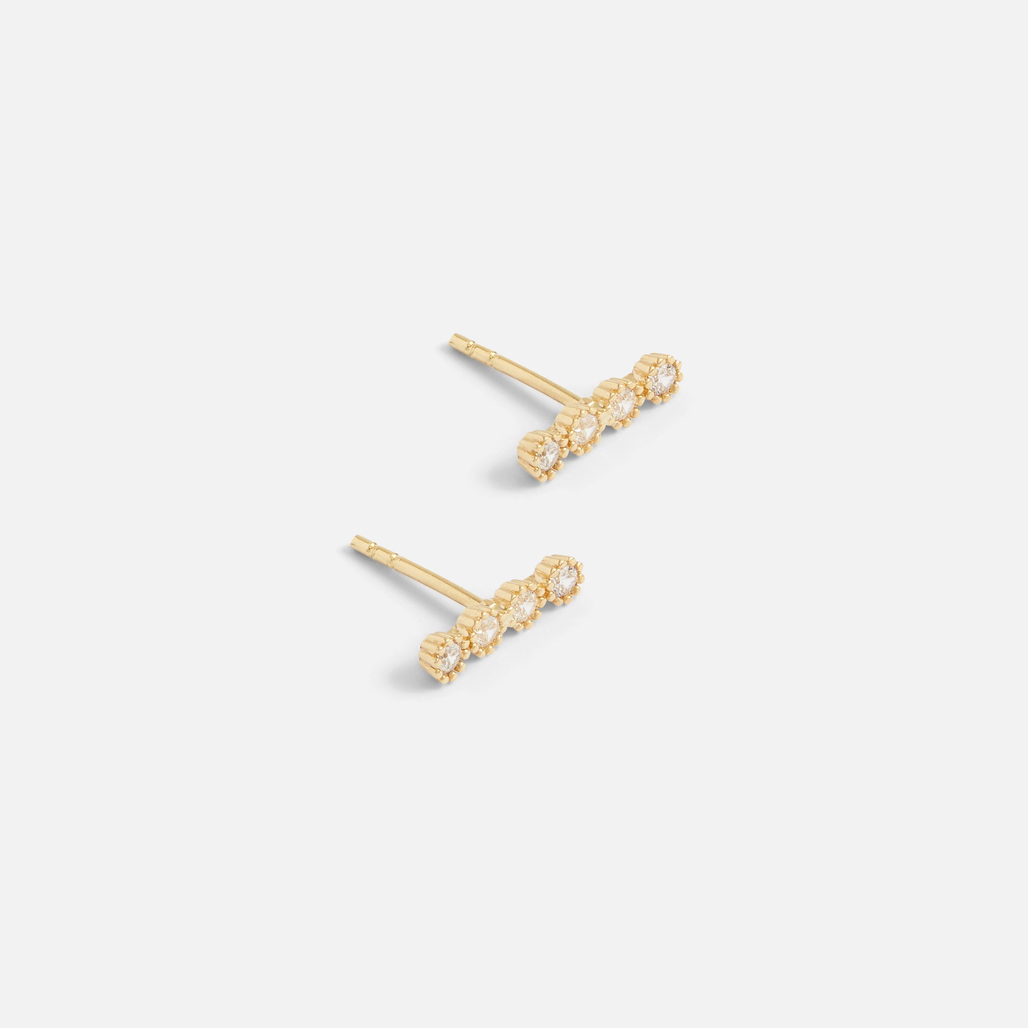 10k yellow gold earrings with four stones