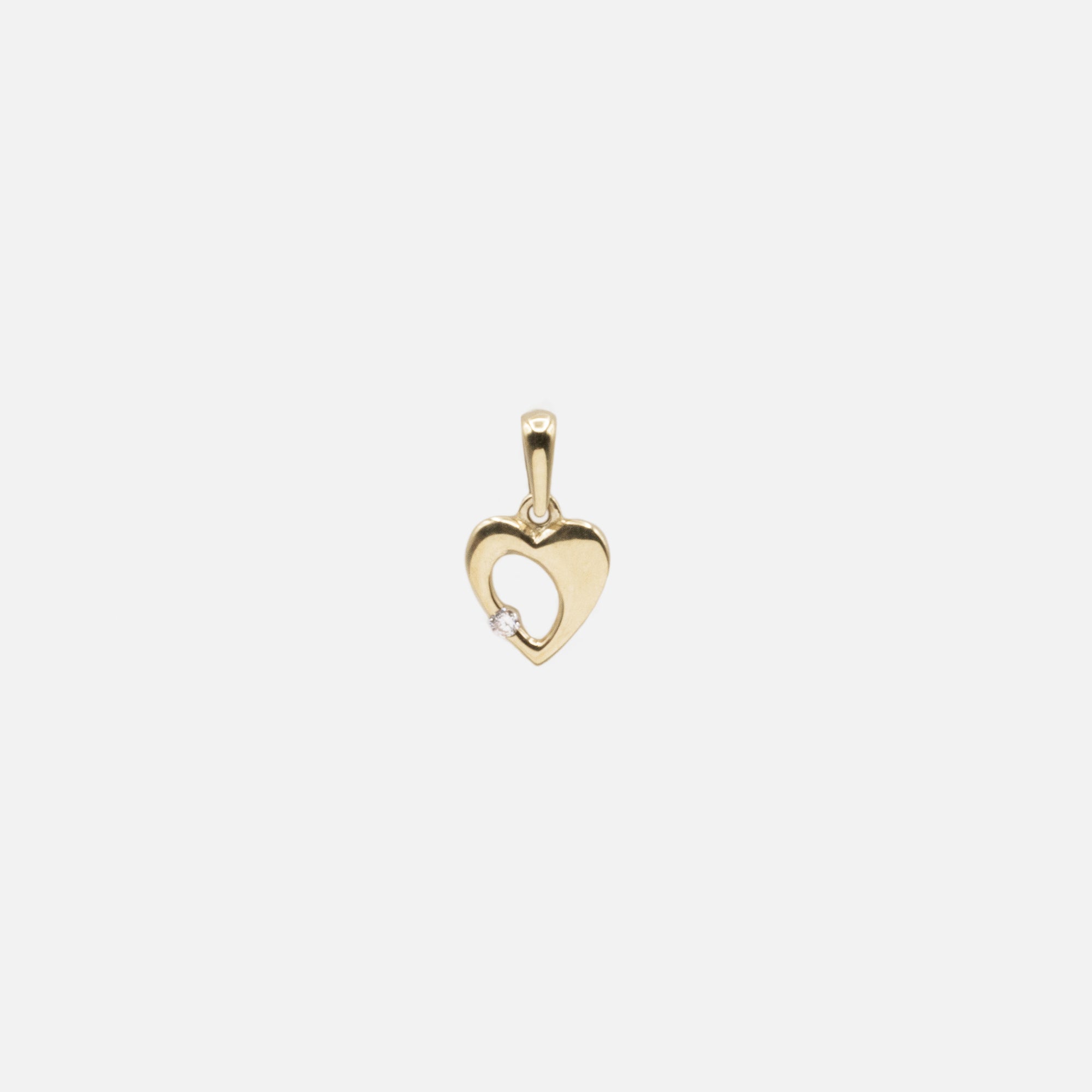 Breloque coeur délicat et son zircon cubique en or 10 carats