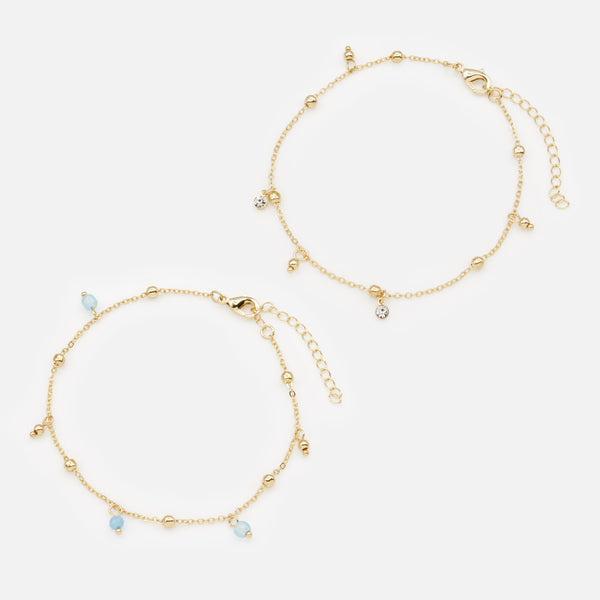 Load image into Gallery viewer, Pair of gold ankle chains with blue beads
