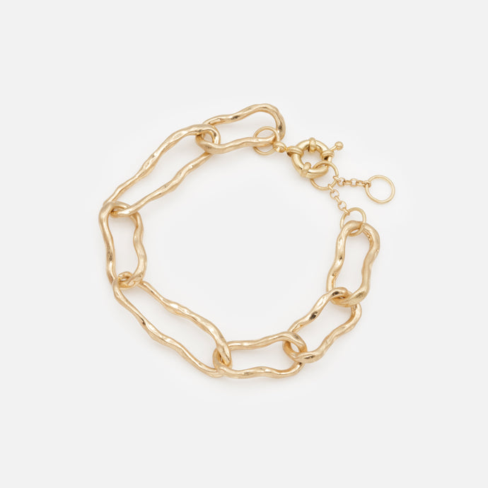 Gold bracelet with large twisted links