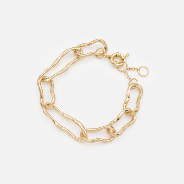 Gold bracelet with large twisted links