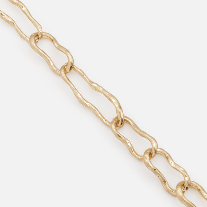 Gold bracelet with large twisted links