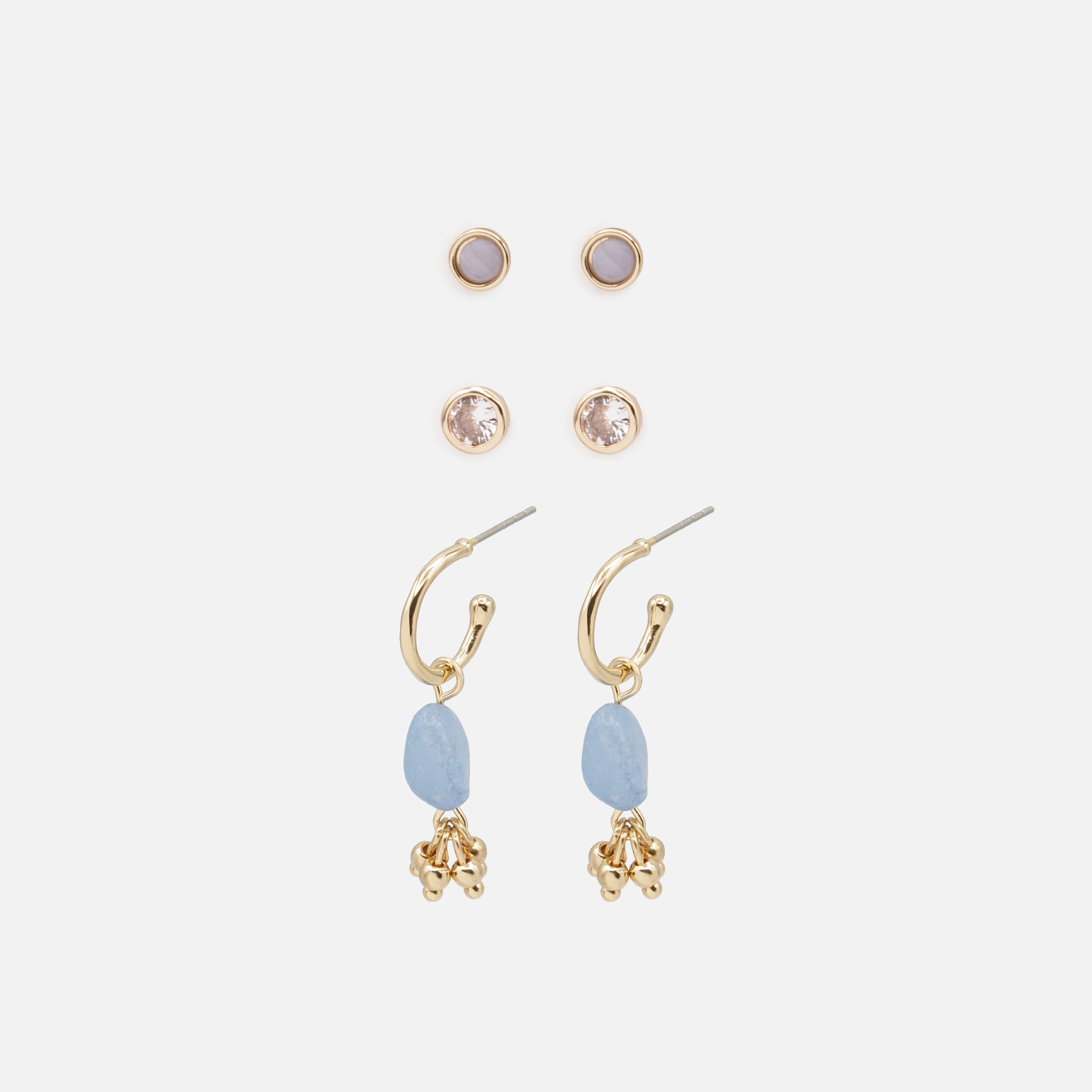 Trio of golden earrings with colored stones
