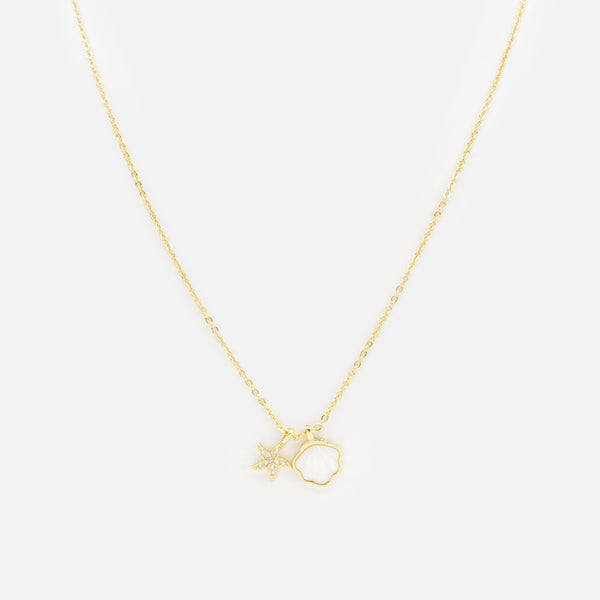 Load image into Gallery viewer, Gold necklace with shell and starfish charms
