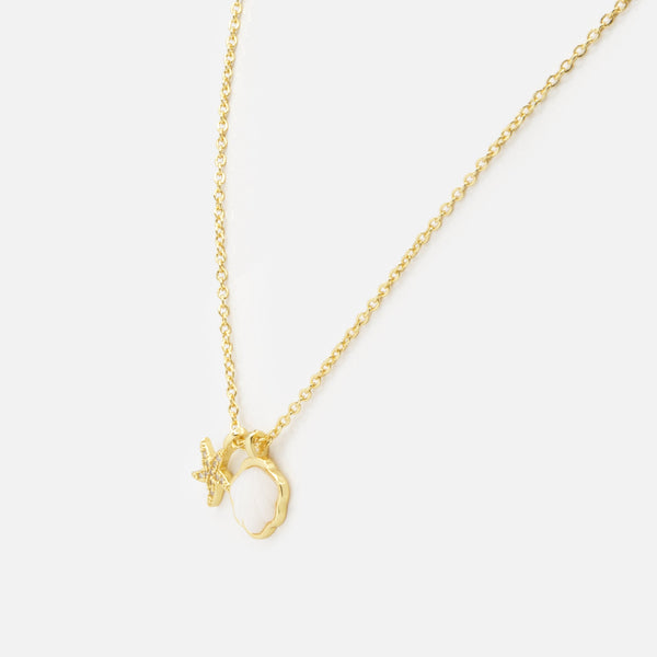 Load image into Gallery viewer, Gold necklace with shell and starfish charms
