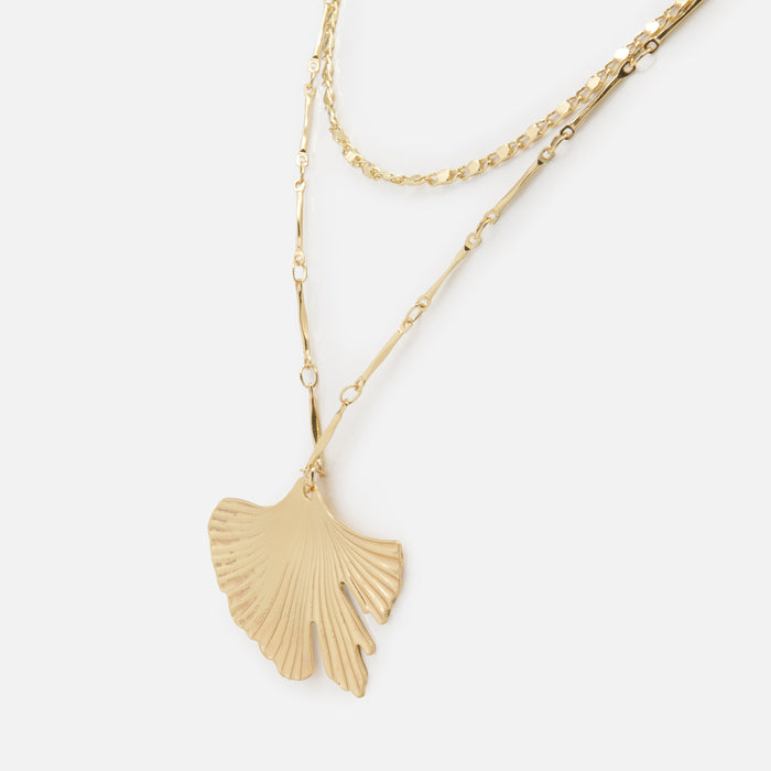 Gold double chain necklace with coral pendant