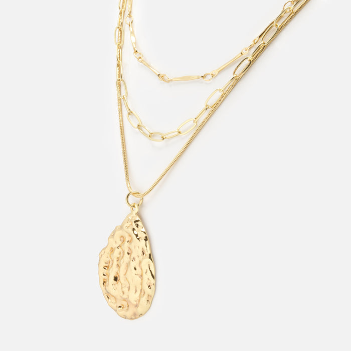 Gold triple chain necklace with textured charm