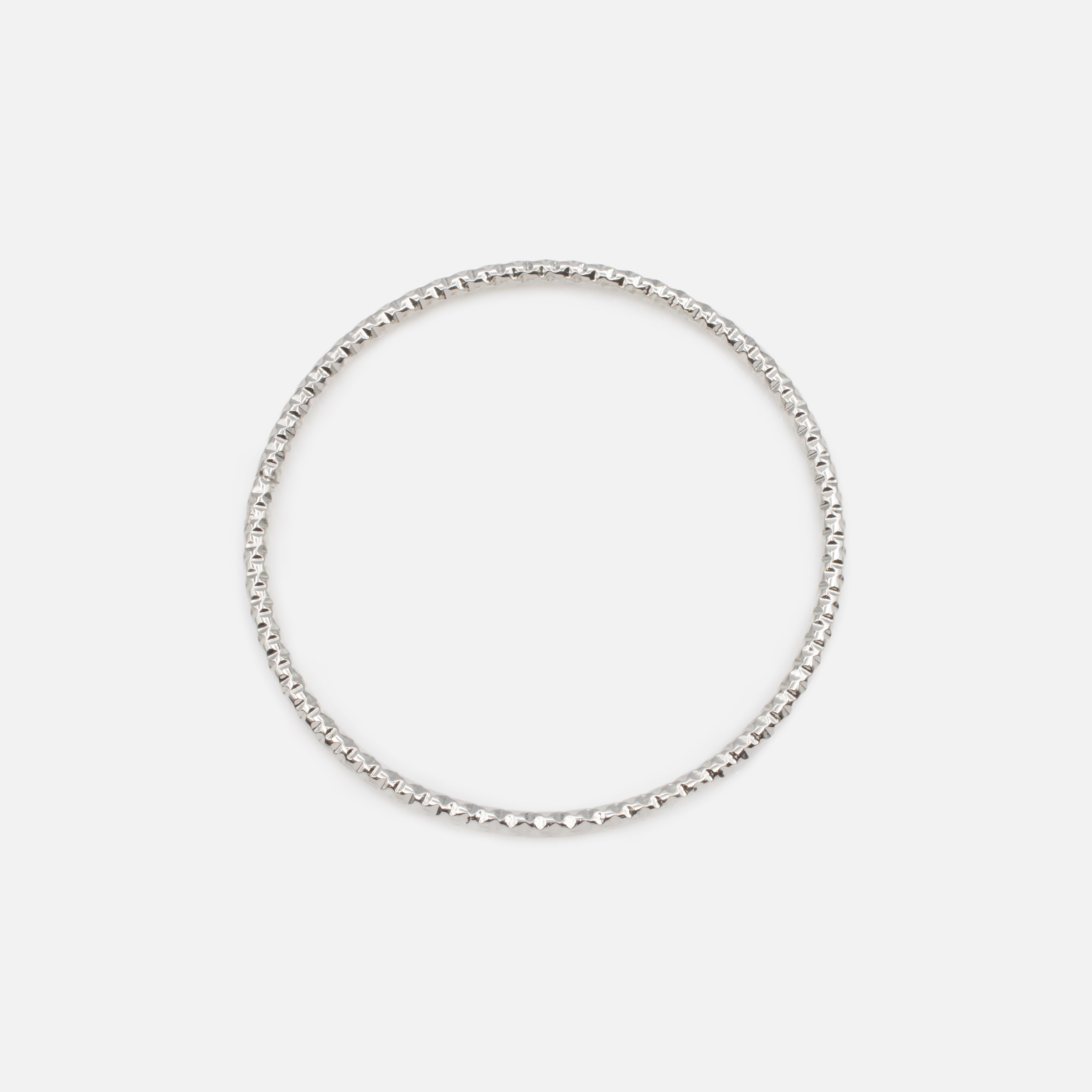 Trio of 3-tone textured rigid bracelets