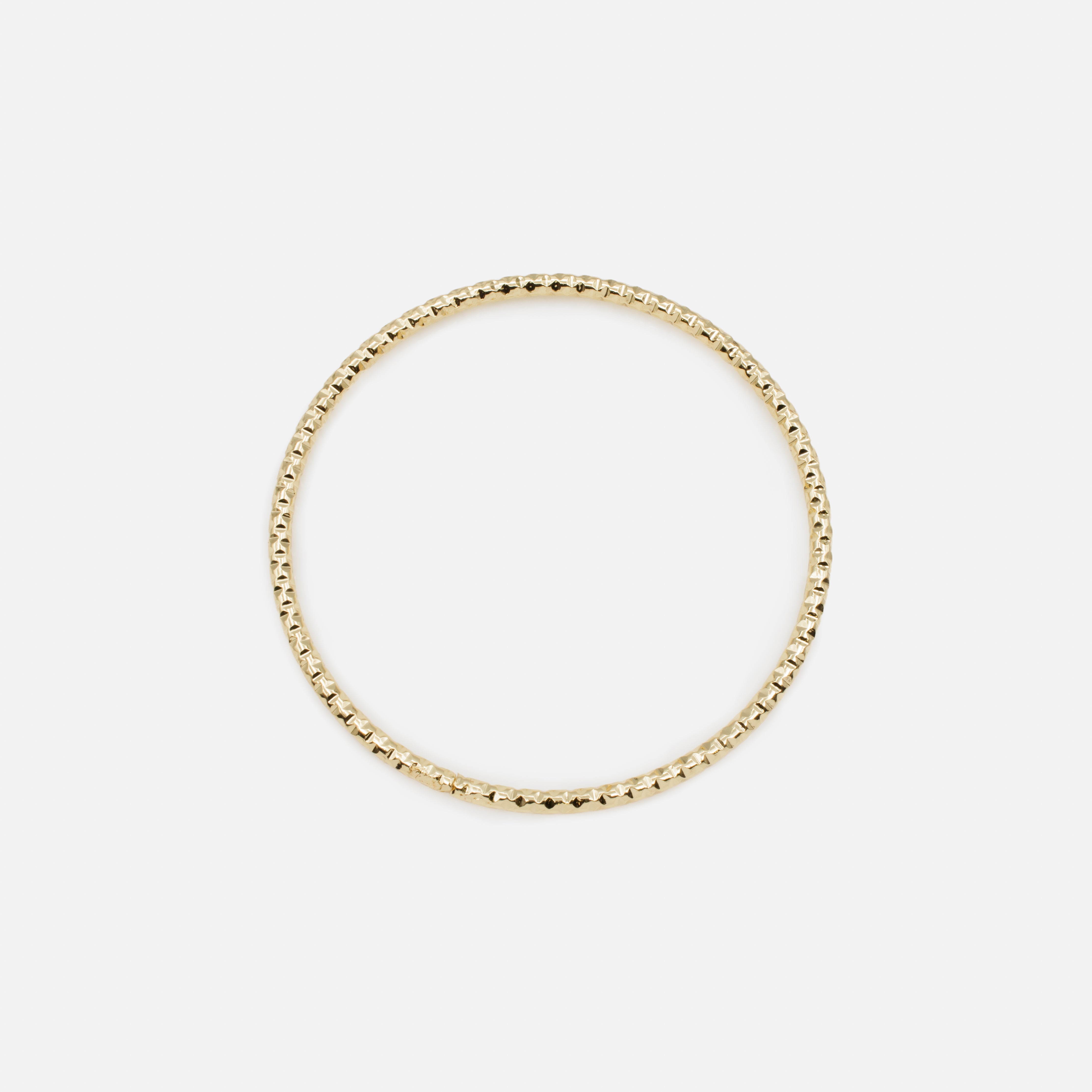 Trio of 3-tone textured rigid bracelets