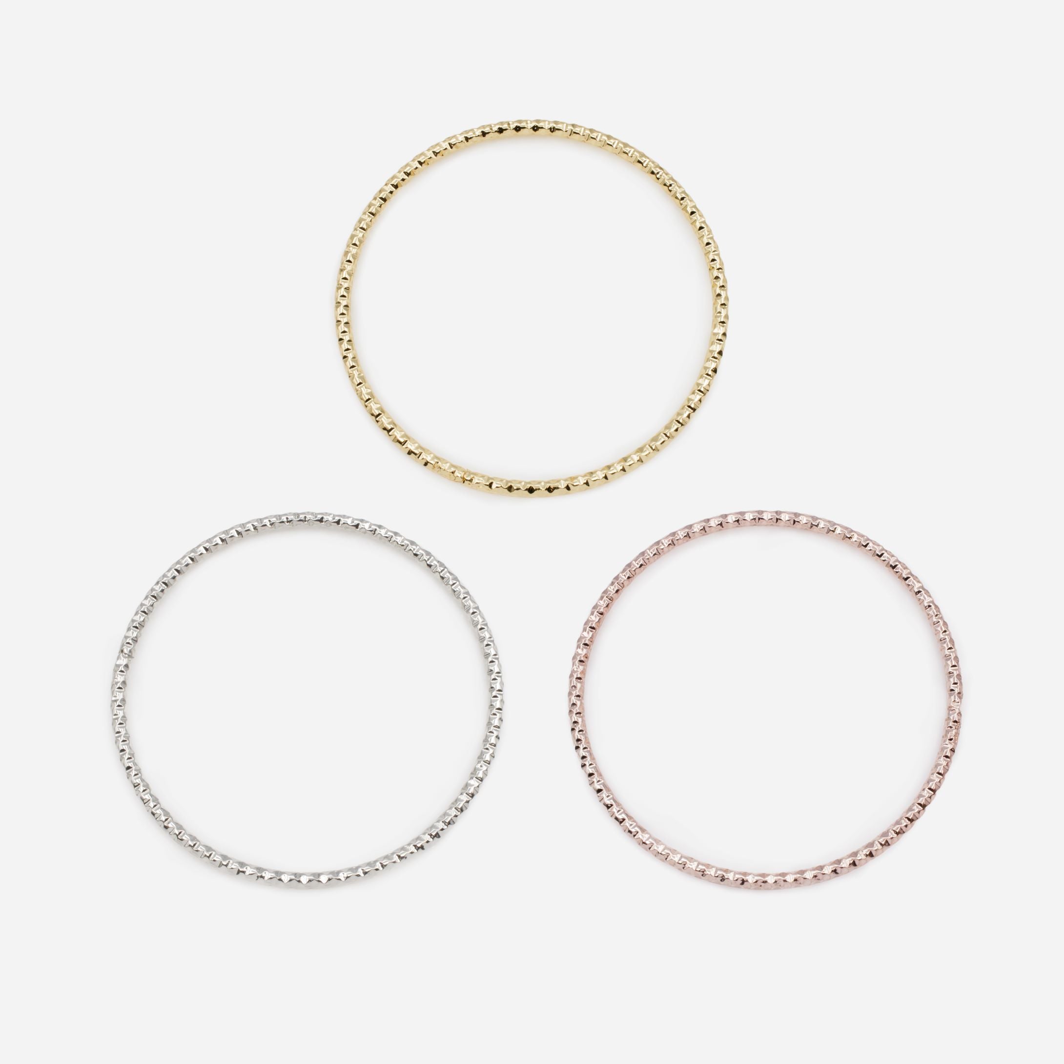 Trio of 3-tone textured rigid bracelets