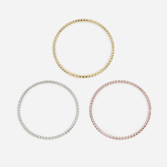 Trio of 3-tone textured rigid bracelets