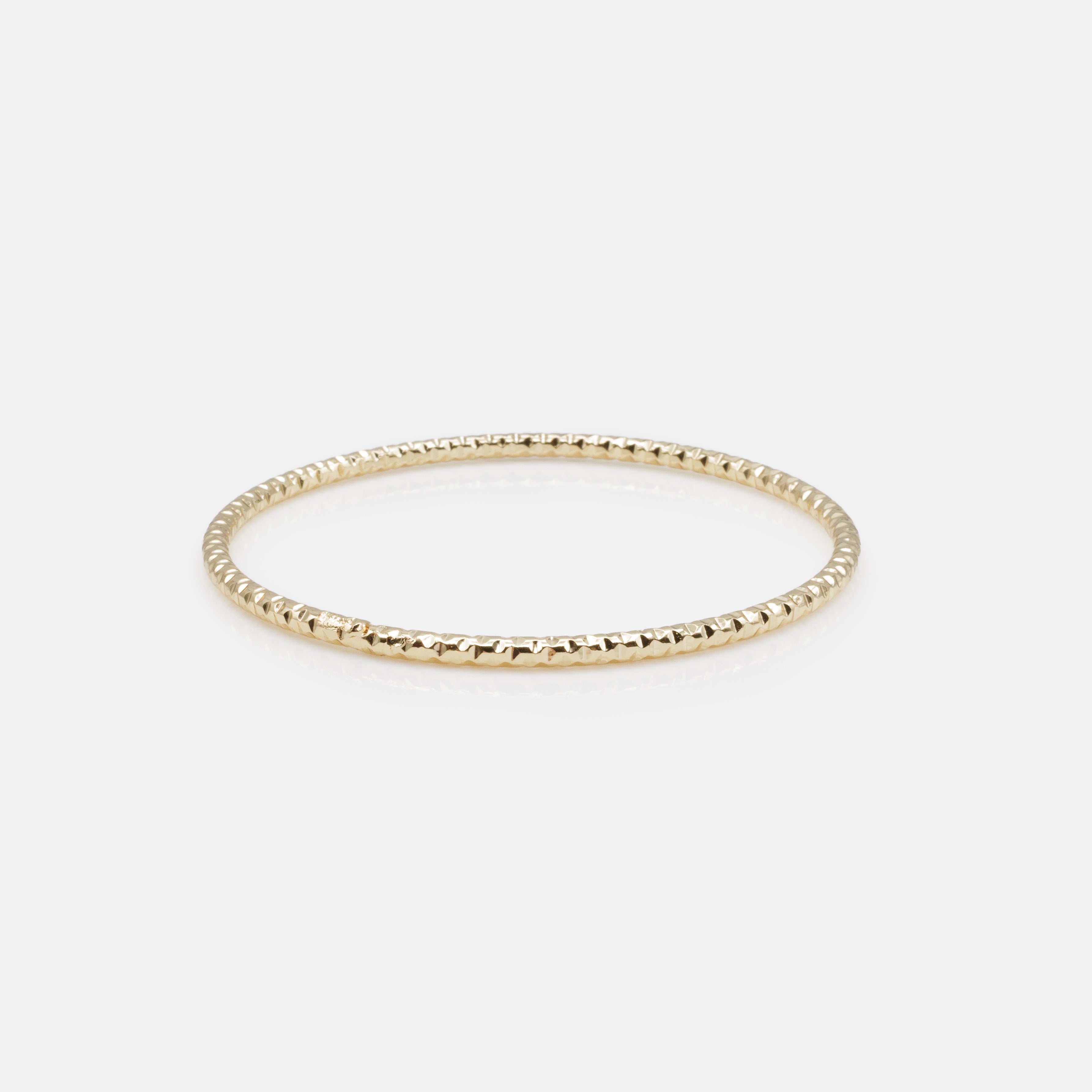 Trio of 3-tone textured rigid bracelets