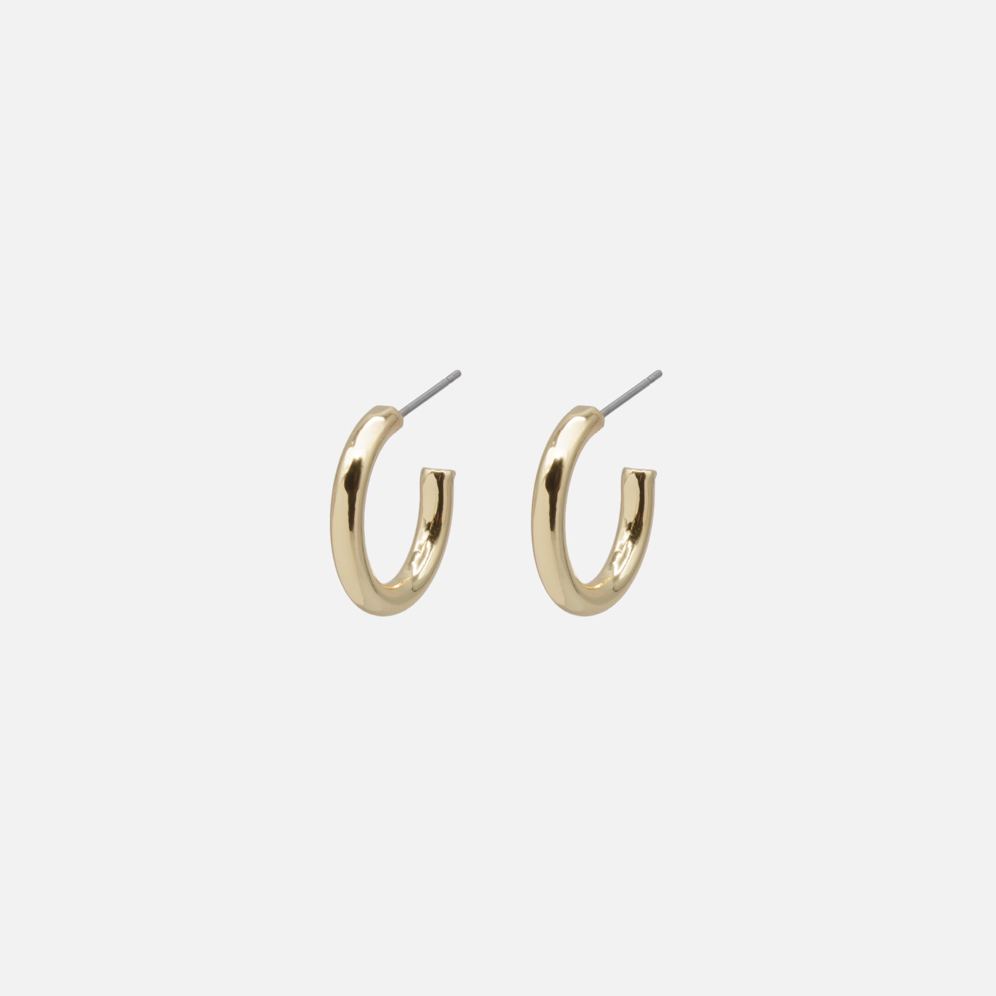 Trio of white butterfly earrings and gold rings
