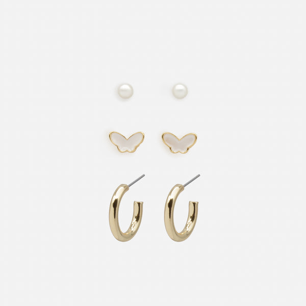 Load image into Gallery viewer, Trio of white butterfly earrings and gold rings
