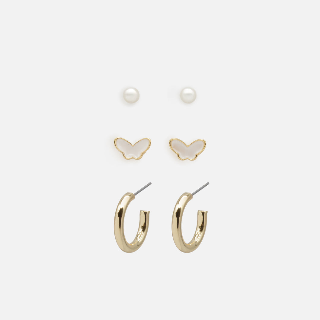 Trio of white butterfly earrings and gold rings
