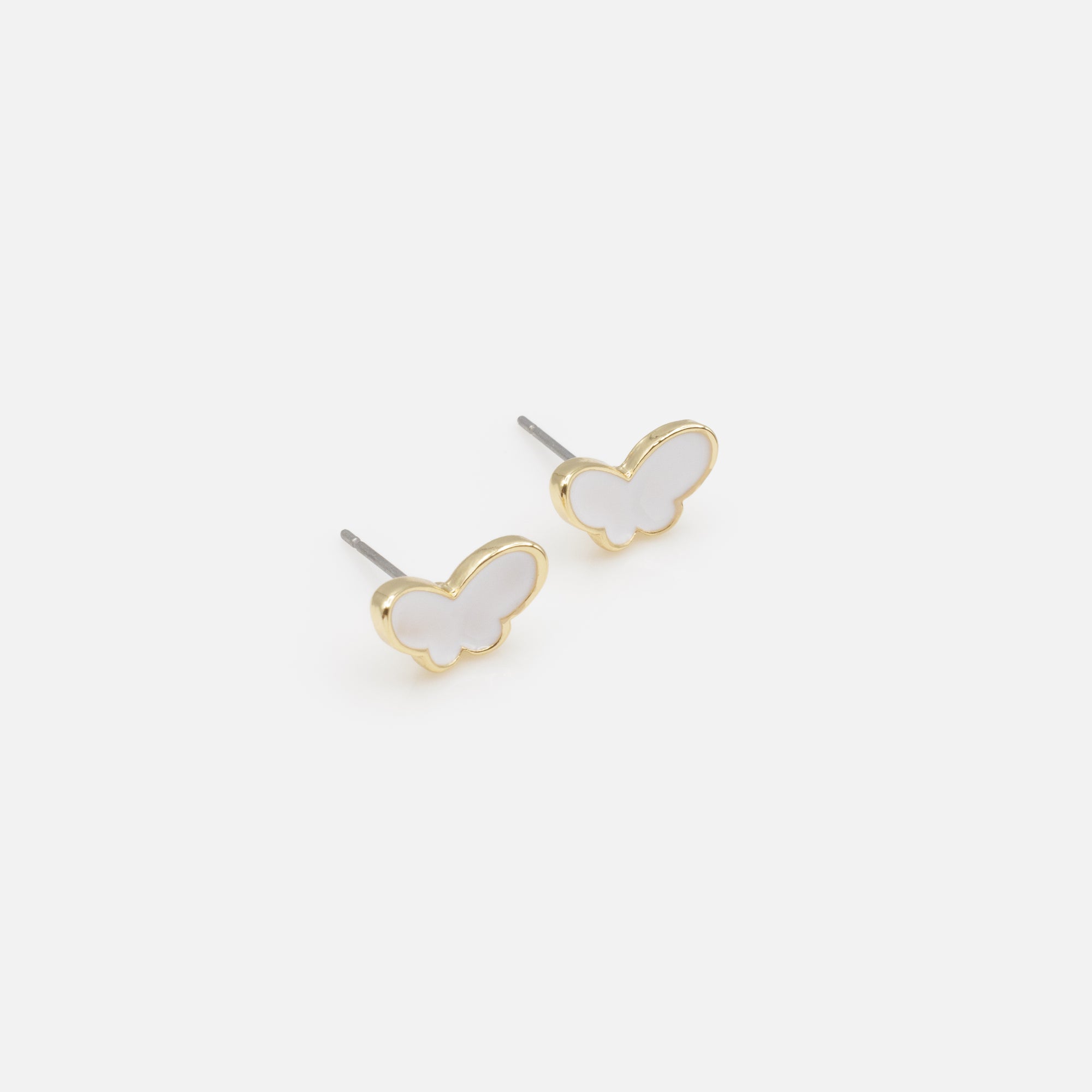 Trio of white butterfly earrings and gold rings