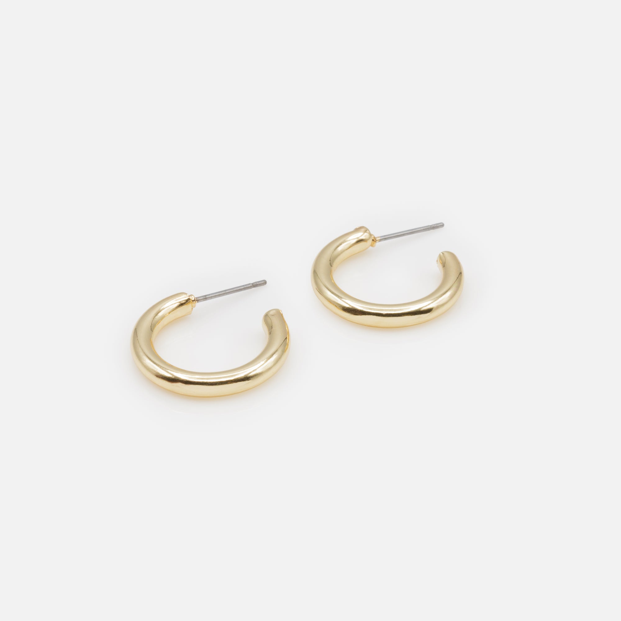 Trio of white butterfly earrings and gold rings