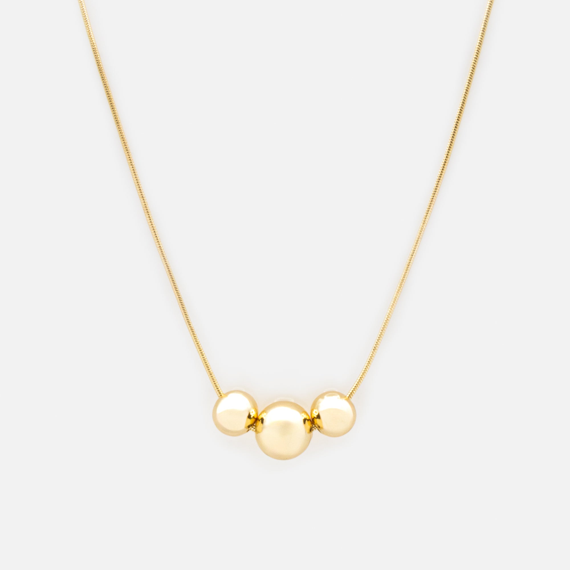 Golden sphere trio necklace