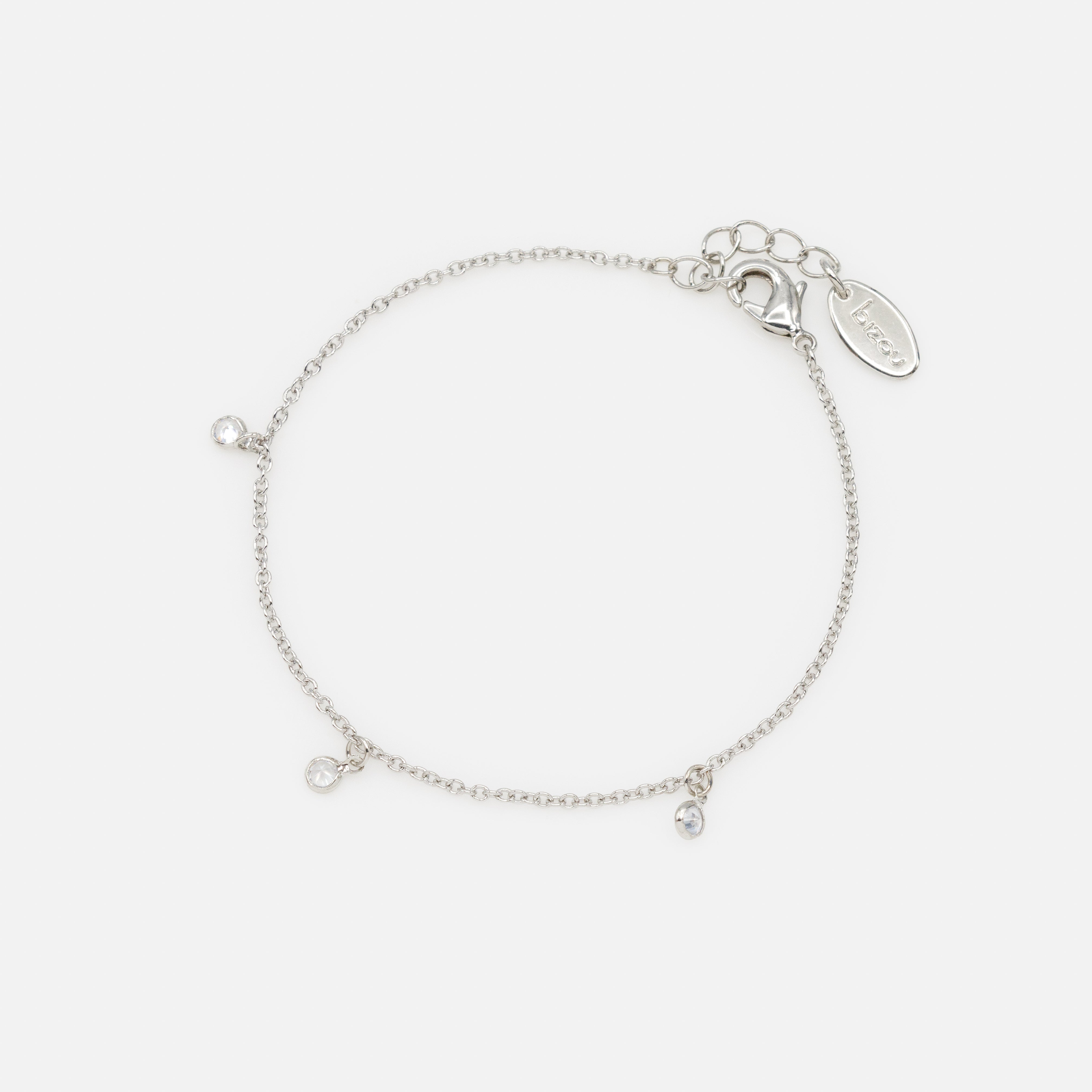 Silver bracelet with small round charms and cubic zirconia