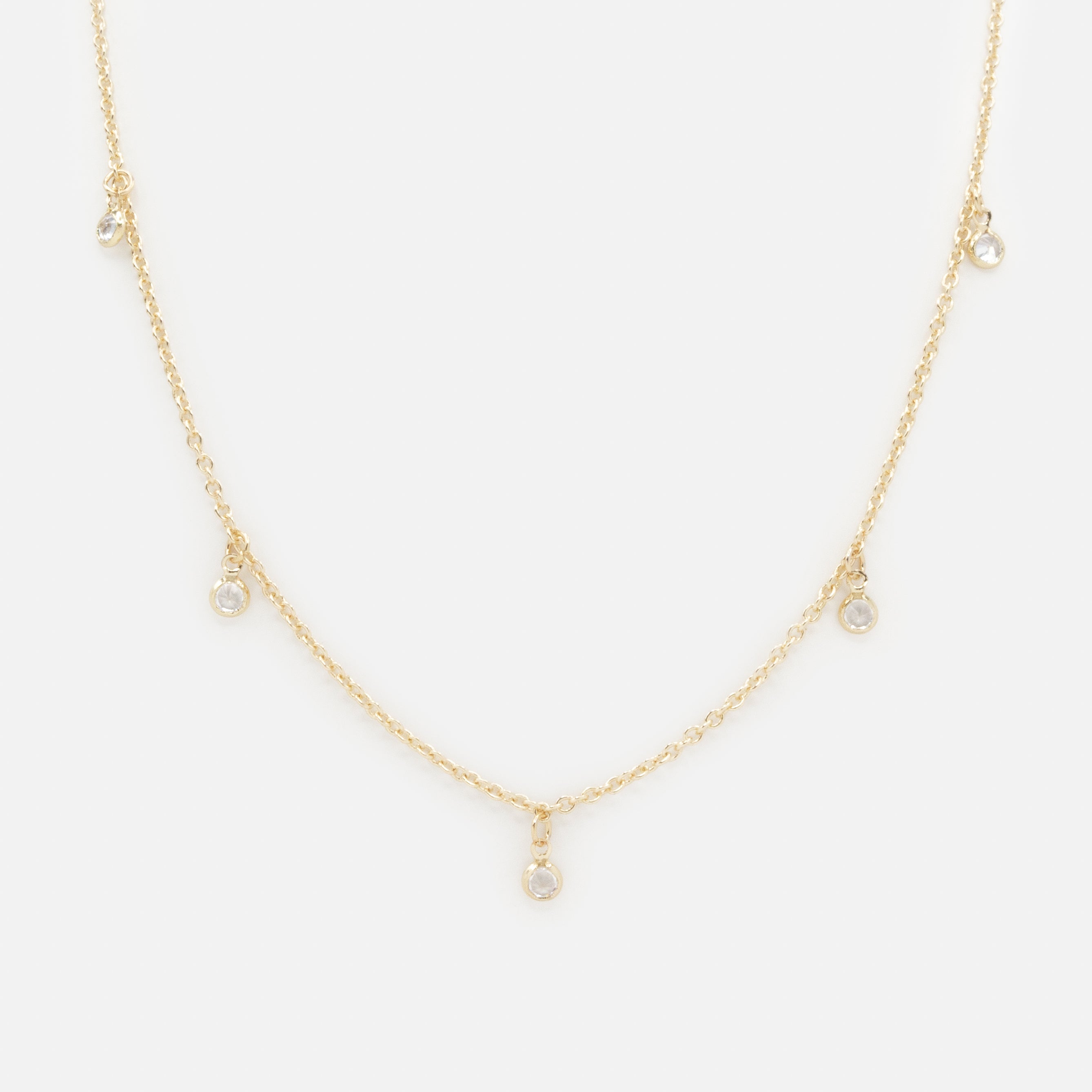 Collier doré petites breloques rondes avec zircons cubiques