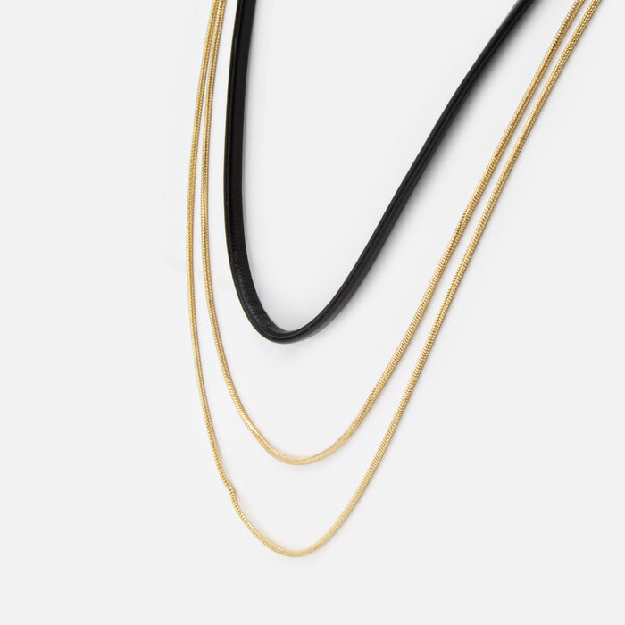 Collier court noir et double chaîne dorée