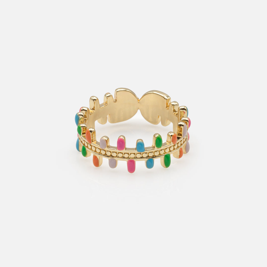 Golden ring with colored spikes