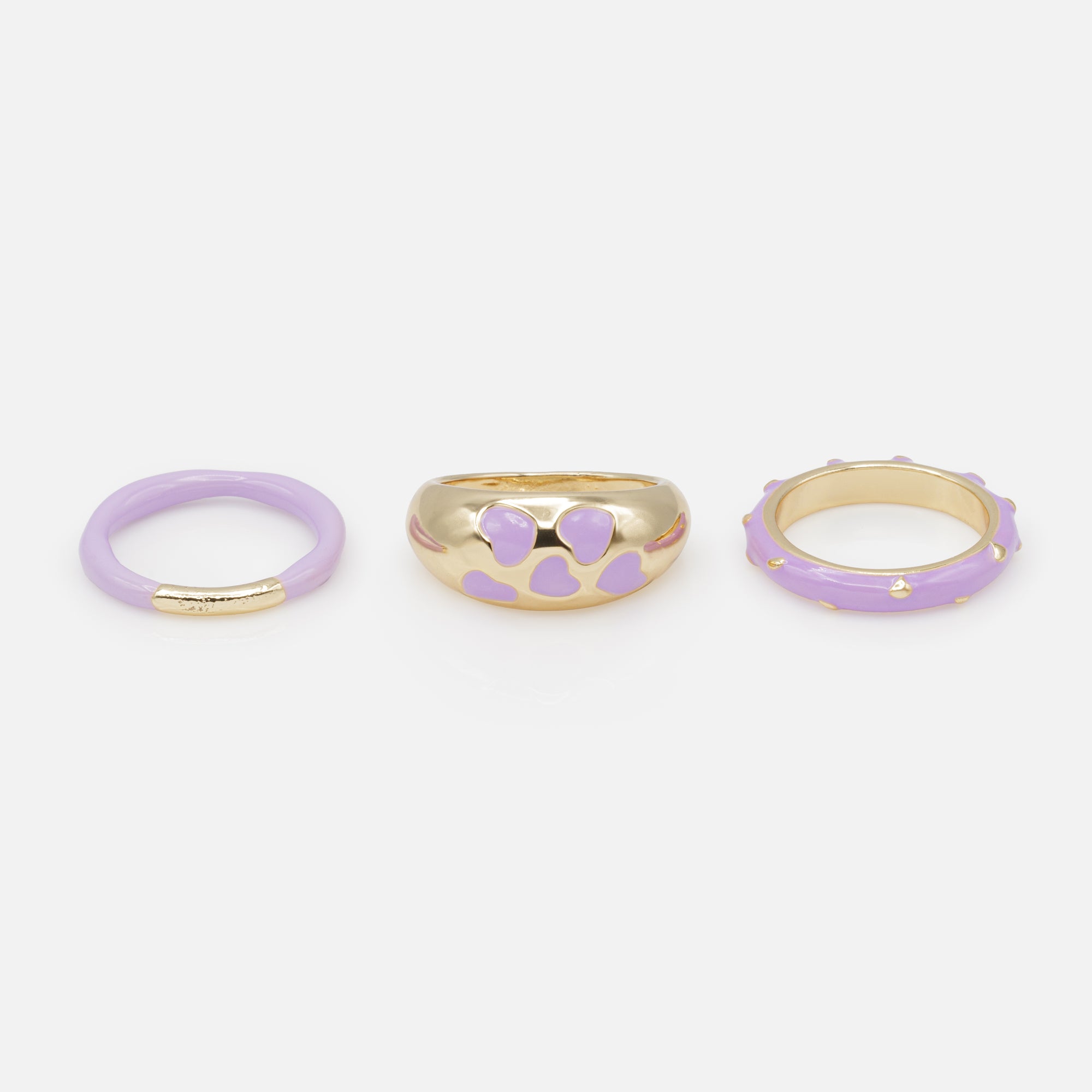 Set of three gold and lilac rings