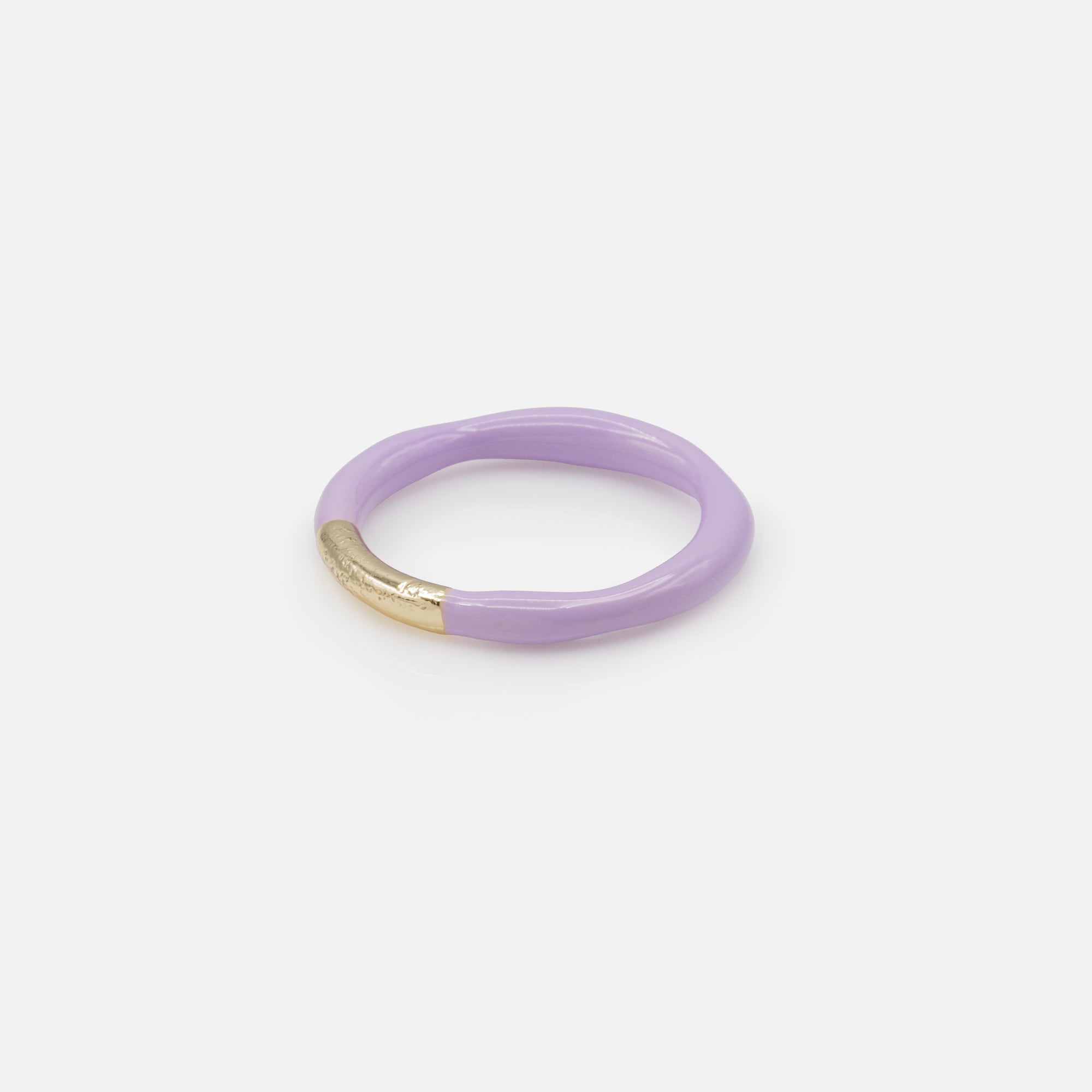 Set of three gold and lilac rings
