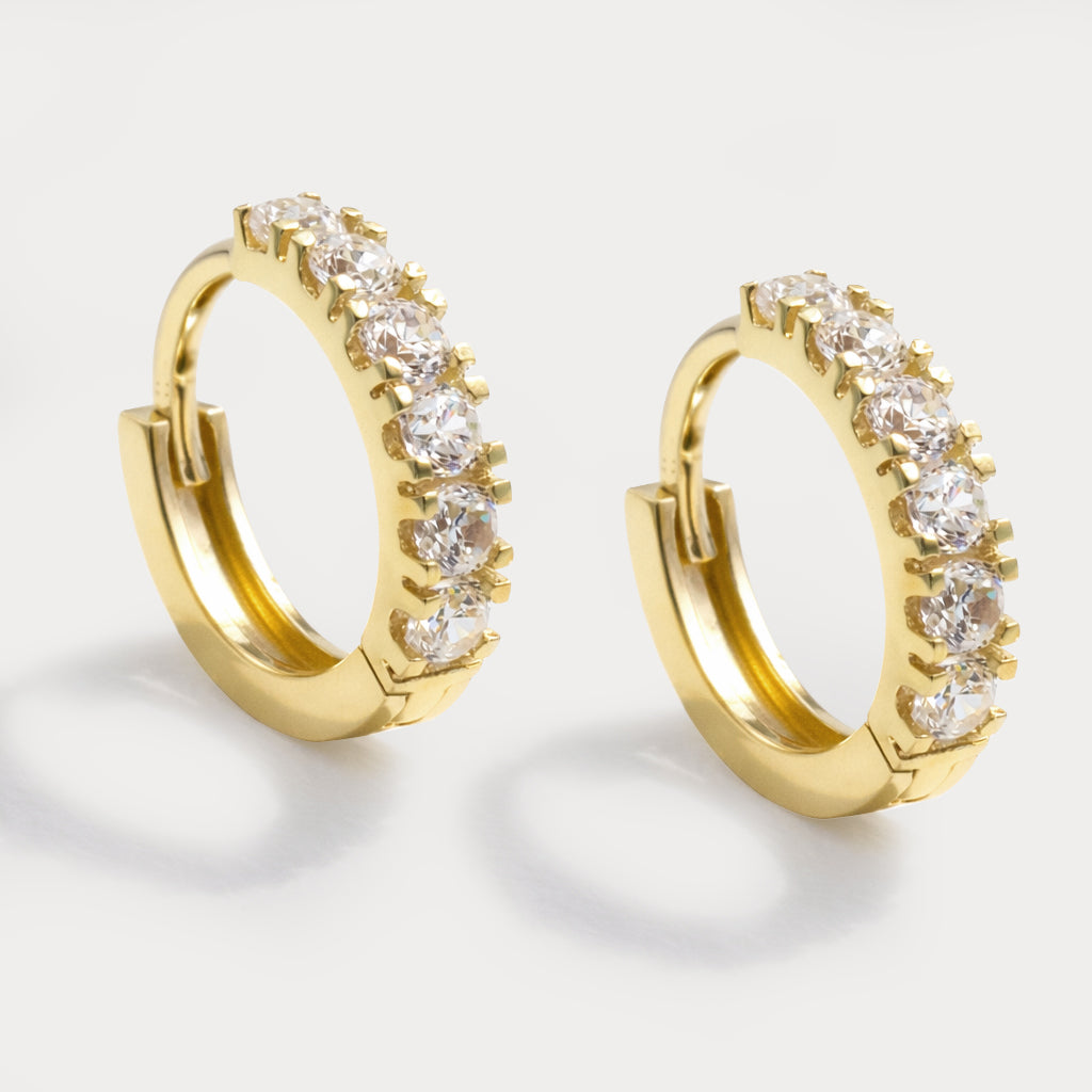 Boucle d'oreilles huggies avec zircons en or 10 carats