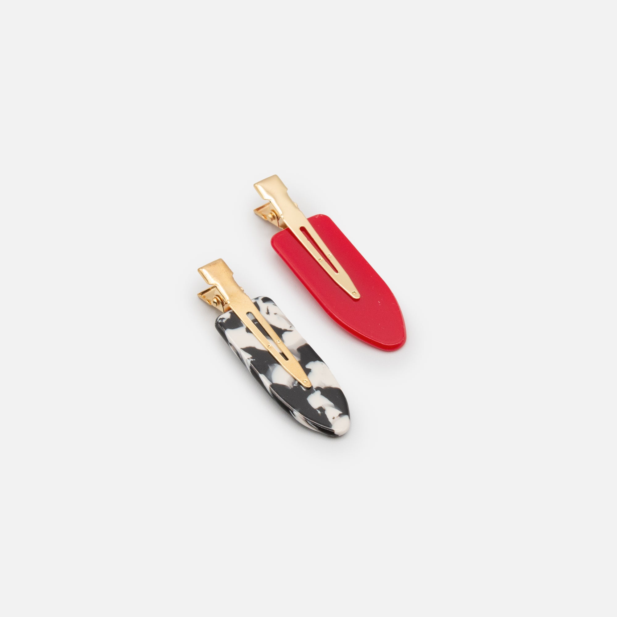 Set of two red and speckled flat pliers