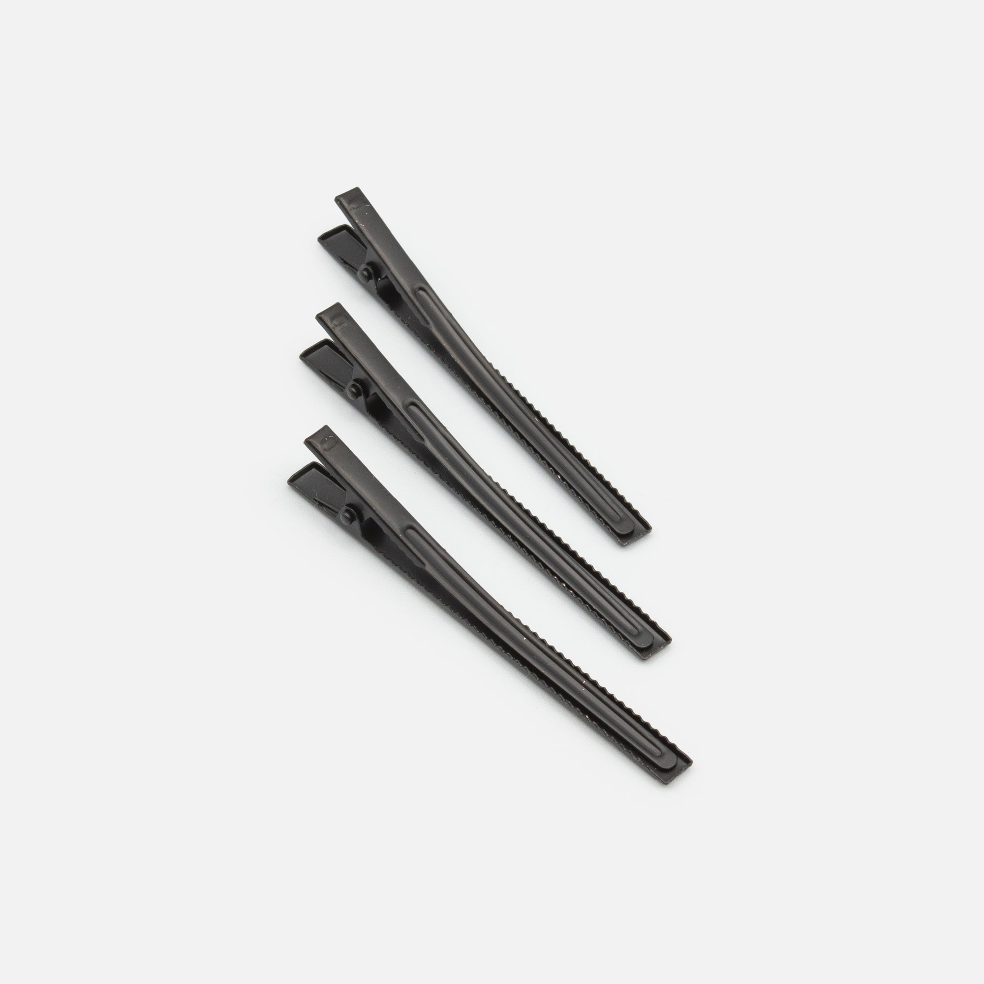 Set of three black hairclips