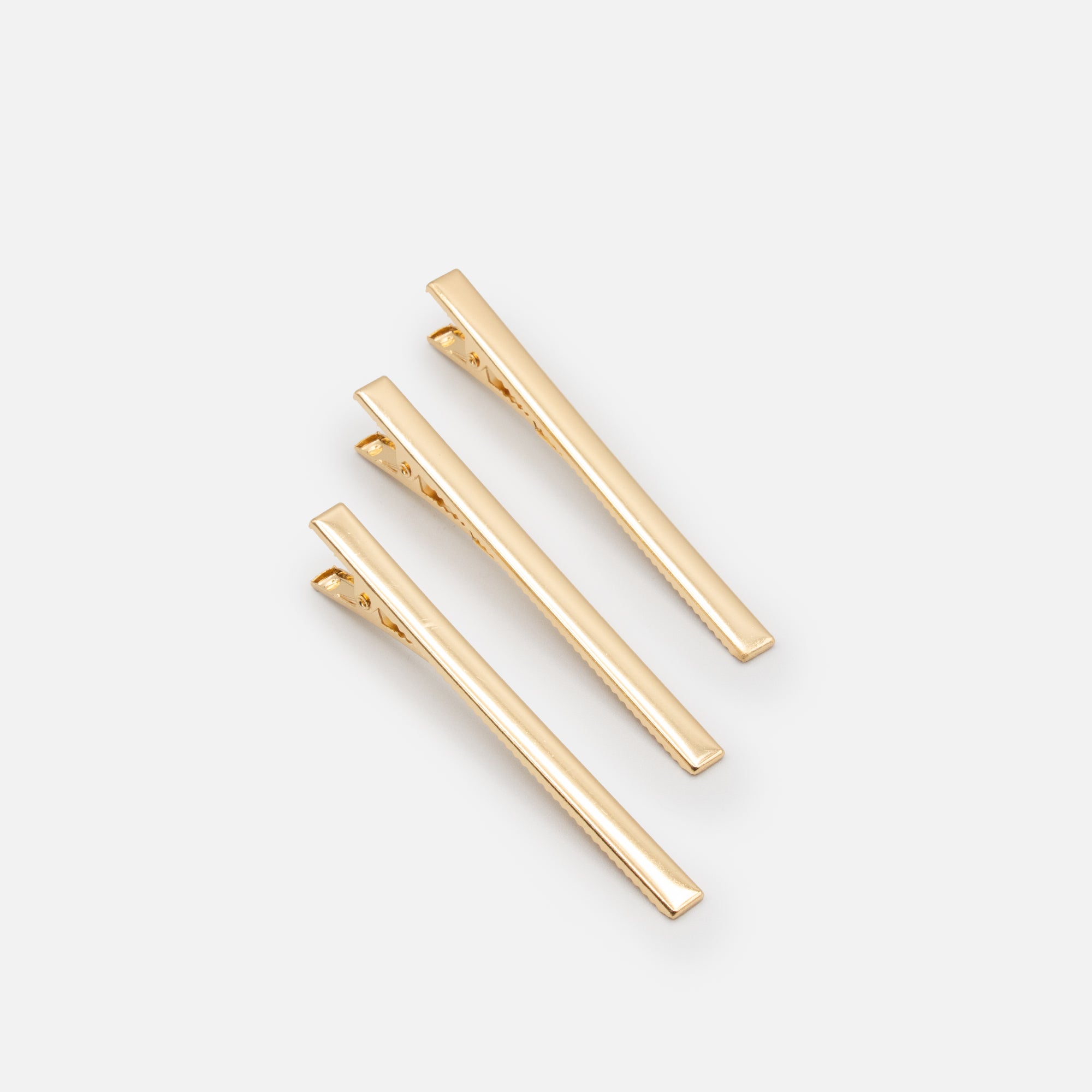 Set of three golden clips