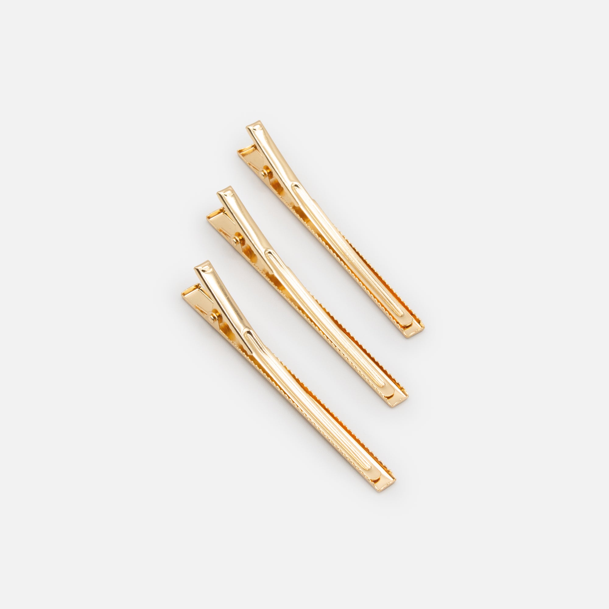 Set of three golden clips