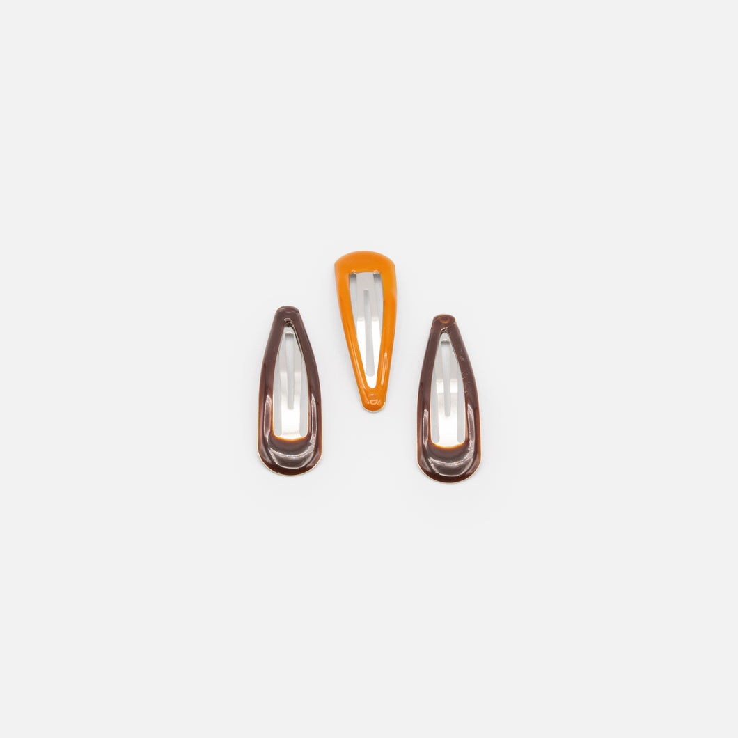 Set of three brown and caramel snap clips