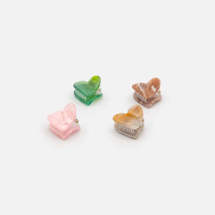 Set of four small heart clips
